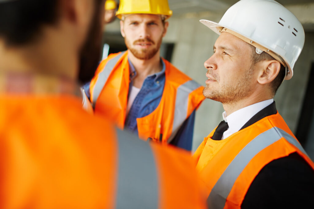 construction workers discussing