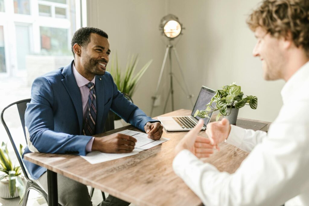 image of an insurance agent talking to a client