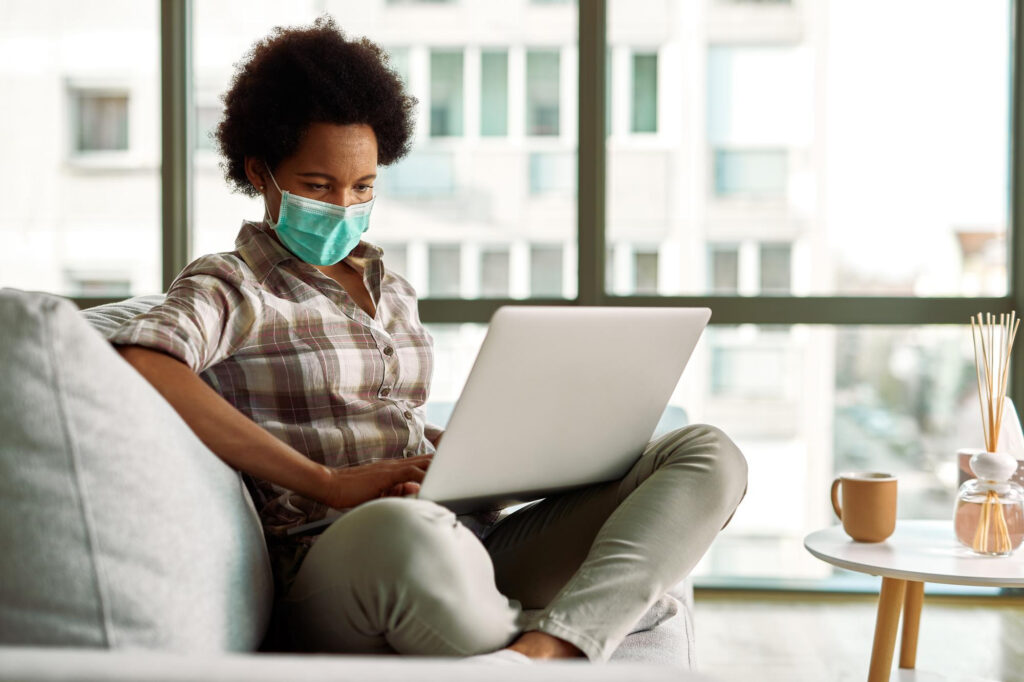 image of remote worker wearing a nose mask