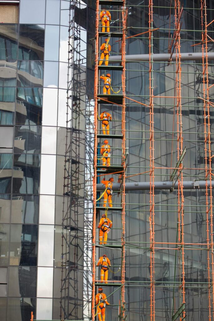 scaffolding contractors at work during the day
