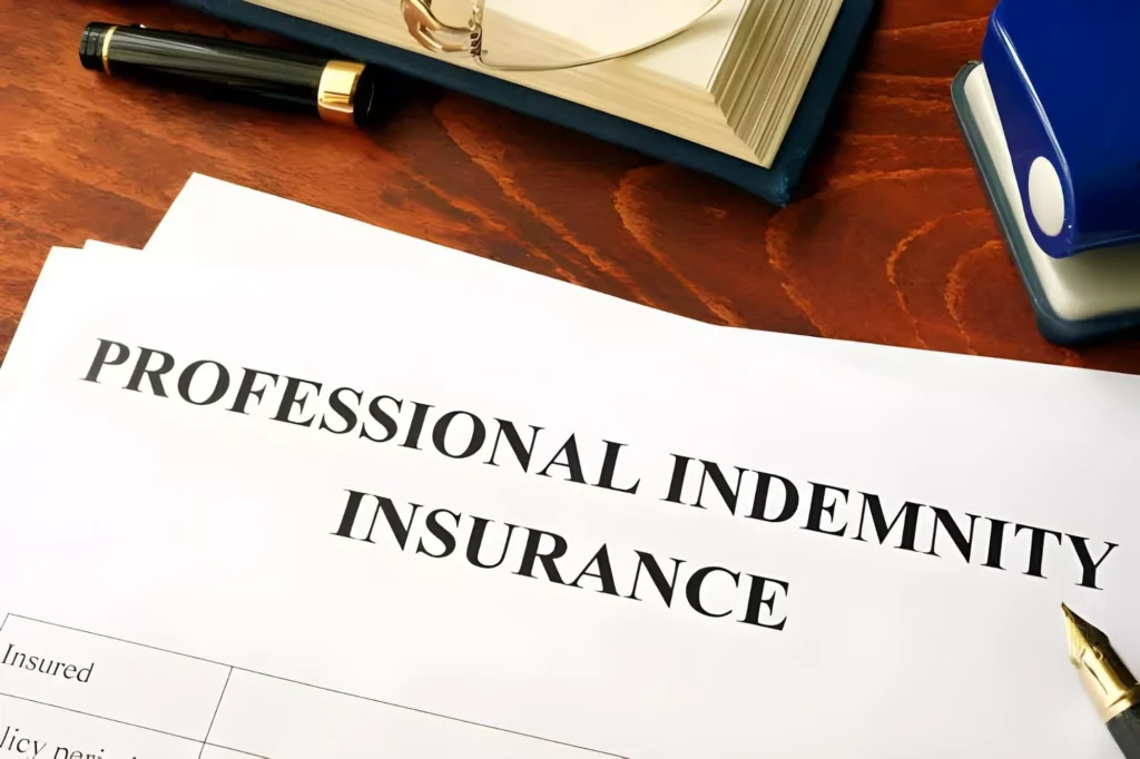 image of a piece of paper on a table with the phrase "professional indemnity insurance" on it | Cost of Professional Indemnity Insurance | HMD Insurance