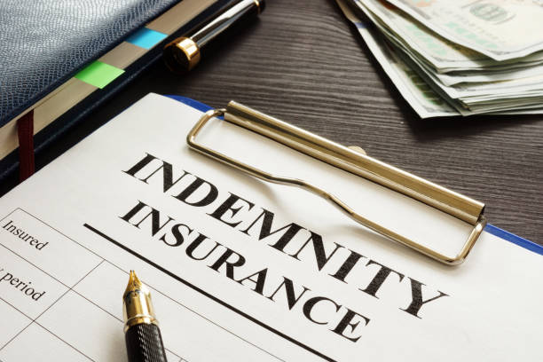 Indemnity insurance policy on the table