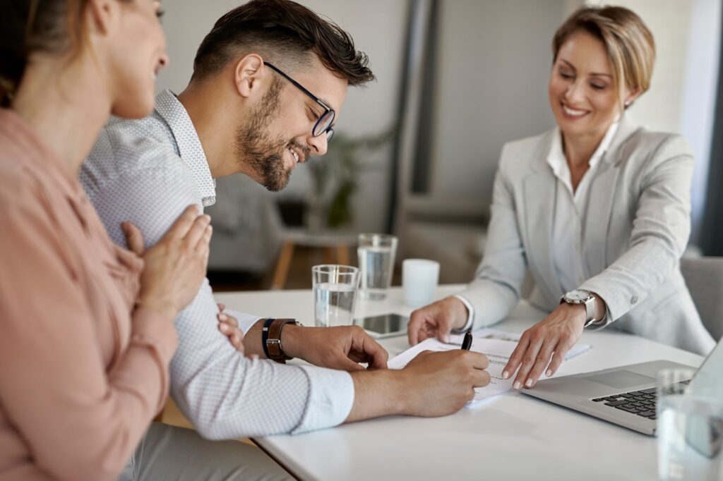 business owner signing papers